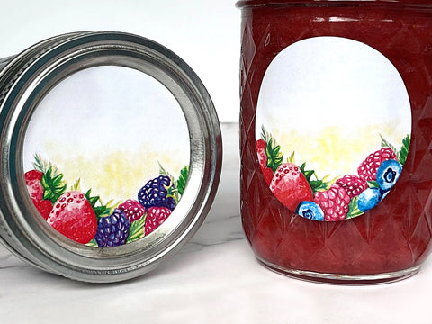 Blank Watercolor Triple Berry Canning Labels on mason jars allow for handwriting text for a variety of canned goods like fruit butter, jam, jelly, preserves, pie filling and more! Label artwork has a mix of strawberry, blueberry, blackberry, and raspberry artwork | CanningCrafts.com