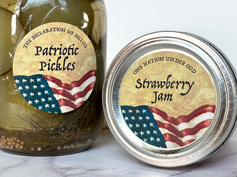 Custom Old Glory Canning Labels on home canned pickles and strawberry jam. The canning jar label artwork shows the American flag with custom text for the jar contents | CanningCrafts.com