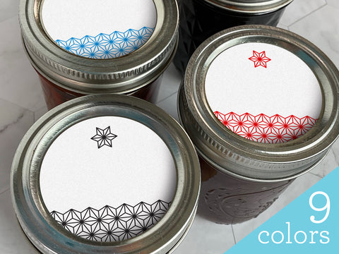 Three canning jars with our Blank Geometric Star Canning Labels on the lids. The bottom of the label has a colored geometric pattern and on top is a small star icon. The label colors are black, red, and blue | Canningrafts.com